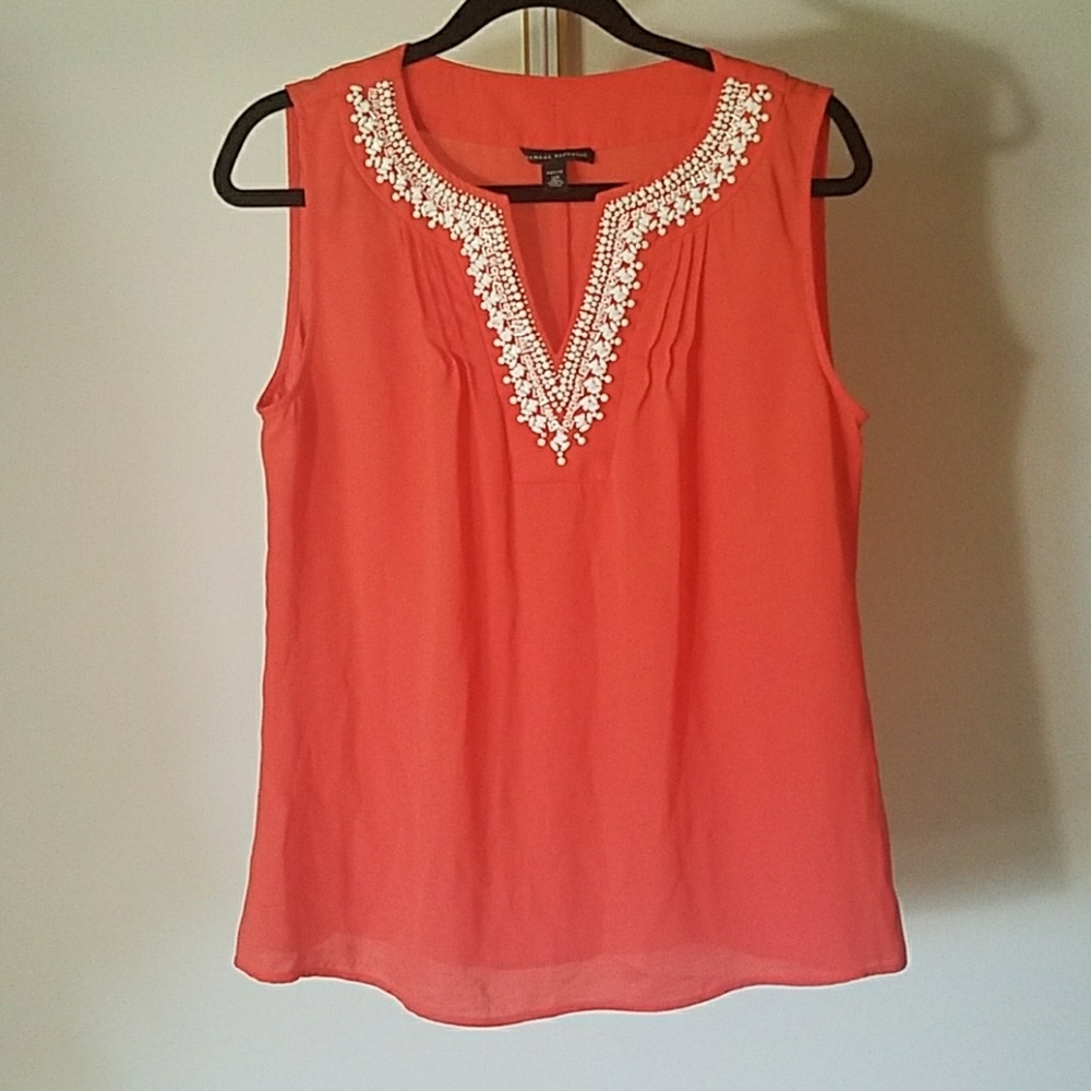 Sleveless blouse orange blouse with detail on neck